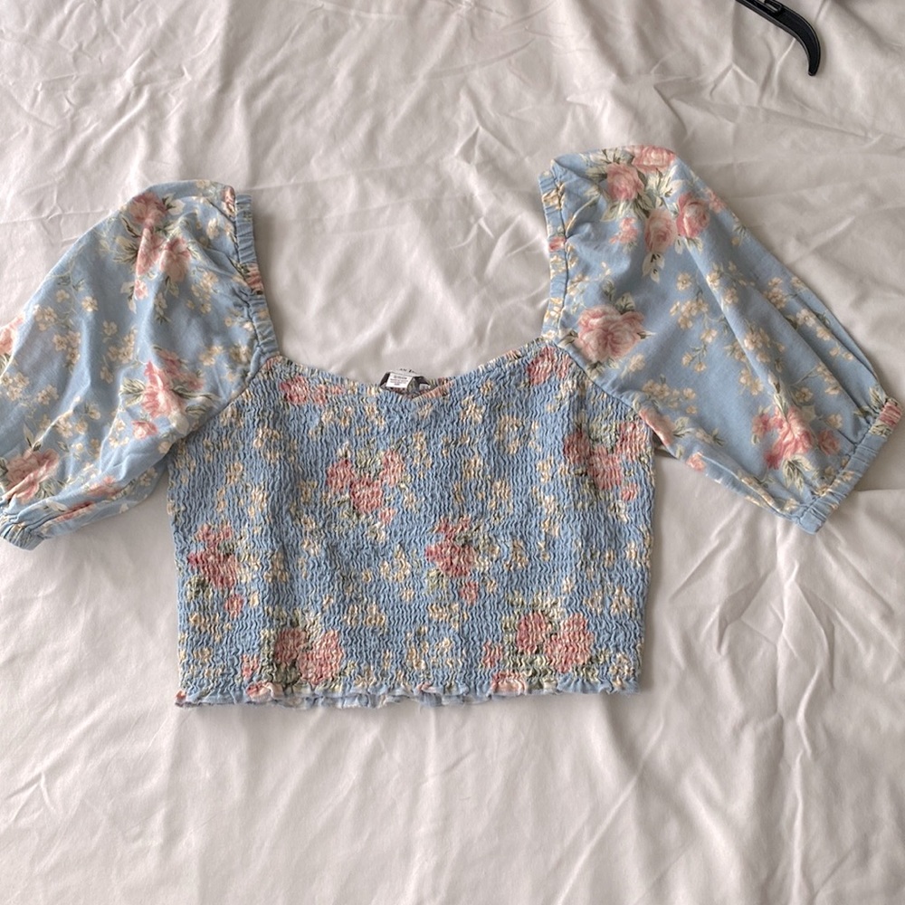 Brand New only worn twice. Cropped but comfortable